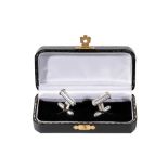 HOLLAND AND HOLLAND: A PAIR OF NOVELTY SILVER CUFFLINKS