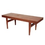 TRIOH: A DANISH TEAK METAMORPHIC DINING TABLE