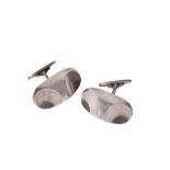 •FLEMMING ESKILDSEN FOR GEORG JENSEN: A PAIR OF SILVER CUFFLINKS