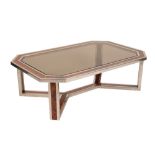 •MANNER OF ROMEO REGA: A CHROME AND FLAMED WALNUT VENEER COFFEE TABLE