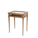 EDWARDIAN MAHOGANY MARQUETRY AND GLAZED BIJOUTERIE TABLE