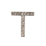 A DIAMOND T BROOCH