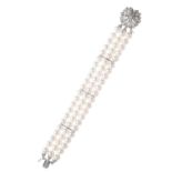 A CULTURED PEARL AND DIAMOND BRACELET