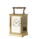 FRENCH BRASS CASED STRIKING CARRIAGE CLOCK
