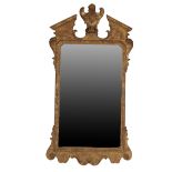 GILTWOOD AND COMPOSITION FRAMED WALL MIRROR