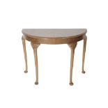 BURR WALNUT AND FEATHER BANDED DEMI-LUNE SIDE TABLE IN GEORGE II STYLE