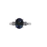 AN 18 CARAT GOLD TANZANITE AND DIAMOND RING