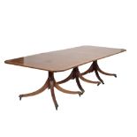 MAHOGANY CROSSBANDED AND SYCAMORE STRUNG TRIPLE PILLAR DINING TABLE