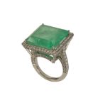 AN EMERALD AND DIAMOND DRESS RING