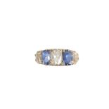 A FIVE STONE SAPPHIRE AND DIAMOND RING