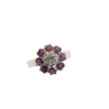 A DIAMOND AND RED SPINEL CLUSTER RING