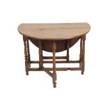 OAK GATELEG DINING TABLE IN JACOBEAN STYLE