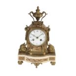 FRENCH BRONZE AND MARBLE MOUNTED STRIKING MANTEL CLOCK