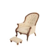 VICTORIAN CARVED WALNUT AND BUTTON UPHOLSTERED SPOONBACK ARMCHAIR