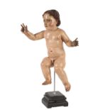 SPANISH CARVED AND POLYCHROME PAINTED WOOD MODEL OF THE INFANT CHRIST