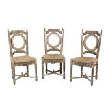 SET OF SIX CONTINENTAL CARVED AND PAINTED BEECH AND RUSH SEATED DINING CHAIRS