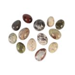 COLLECTION OF TWELVE VARIOUS MARBLE AND HARDSTONE MODELS OF EGGS