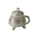 ARCHAIC STYLE SILVERED BRONZE COVERED VESSEL