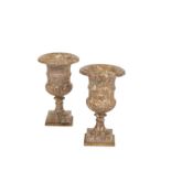 PAIR OF POLISHED FOSSIL STONE AND GILT METAL MOUNTED MODELS OF CAMPANA URNS