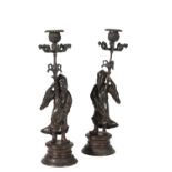 PAIR OF PATINATED BRONZE FIGURAL CANDLE HOLDERS