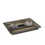 A CUT BRASS INLAID EBONY DESK STAND