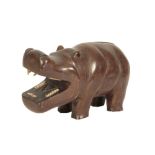 AFRICAN SCULPTED HARDWOOD AND BONE INSET MODEL OF A HIPPOPOTAMUS