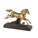 CONTINENTAL GILT BRONZE MODEL OF A LEAPING HORSE