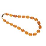 A BUTTERSCOTCH AMBER BEAD NECKLACE