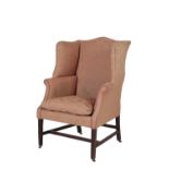 LATE GEORGE II OR GEORGE III WALNUT AND LATER UPHOLSTERED WING ARMCHAIR