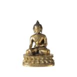 SMALL SEATED GILT-BRONZE BUDDHA, TIBET 16TH / 17TH CENTURY