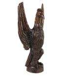 CONTINENTAL, PROBABLY SPANISH CARVED AND STAINED BEECHWOOD MODEL OF A PHOENIX
