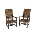 PAIR OF CARVED WALNUT AND TAPESTRY UPHOLSTERED ARMCHAIRS IN CHARLES II STYLE