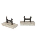 PAIR OF VICTORIAN CAST IRON AND LIMESTONE MOUNTED BOOTSCRAPES