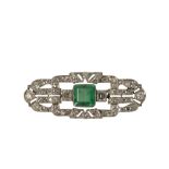 AN EMERALD AND DIAMOND BROOCH