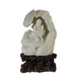 FINE CARVED WHITE JADE GROUP, QING OR LATER