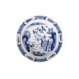 LARGE ENGLISH BLUE AND WHITE DELFT CHARGER, 18TH CENTURY