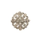 A DIAMOND CLUSTER BROOCH