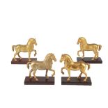 SET OF FOUR GILT BRONZE MODELS OF THE HORSES OF SAINT MARK'S BASILICA