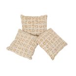 THREE CUSHIONS DESIGNED BY NATTIER