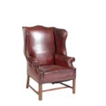 GEORGE III STYLE WING BACK ARMCHAIR