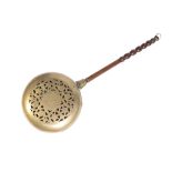 PIERCED BRASS WARMING PAN WITH LATER OAK HANDLE