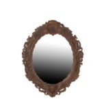 VICTORIAN CARVED OAK FRAMED OVAL WALL MIRROR
