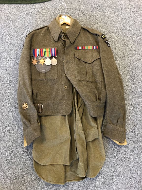 A UNIFORM AND MEDAL GROUPING TO WARRANT OFFICER TURSCOTT REME