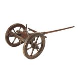 A MAHOGANY CANNON CARRIAGE