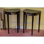 A PAIR OF REGENCY STYLE BLACK AND GILT LACQUER SIDE TABLES