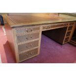 A LARGE HARDWOOD VENEERED AND PARQUETRY DESK BY MARTIN DODGE