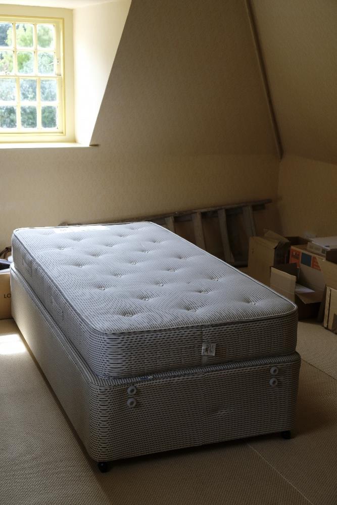 A SINGLE DIVAN BED