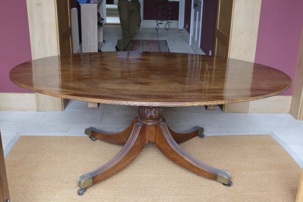 A LARGE LATE GEORGE III MAHOGANY BREAKFAST TABLE