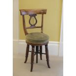 A REGENCY ROSEWOOD PIANO STOOL