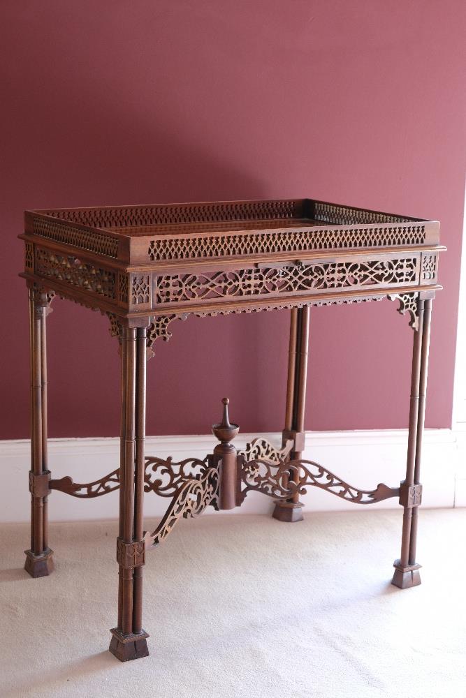 A GEORGE III STYLE MAHOGANY SILVER TABLE OF CHIPPENDALE DESIGN